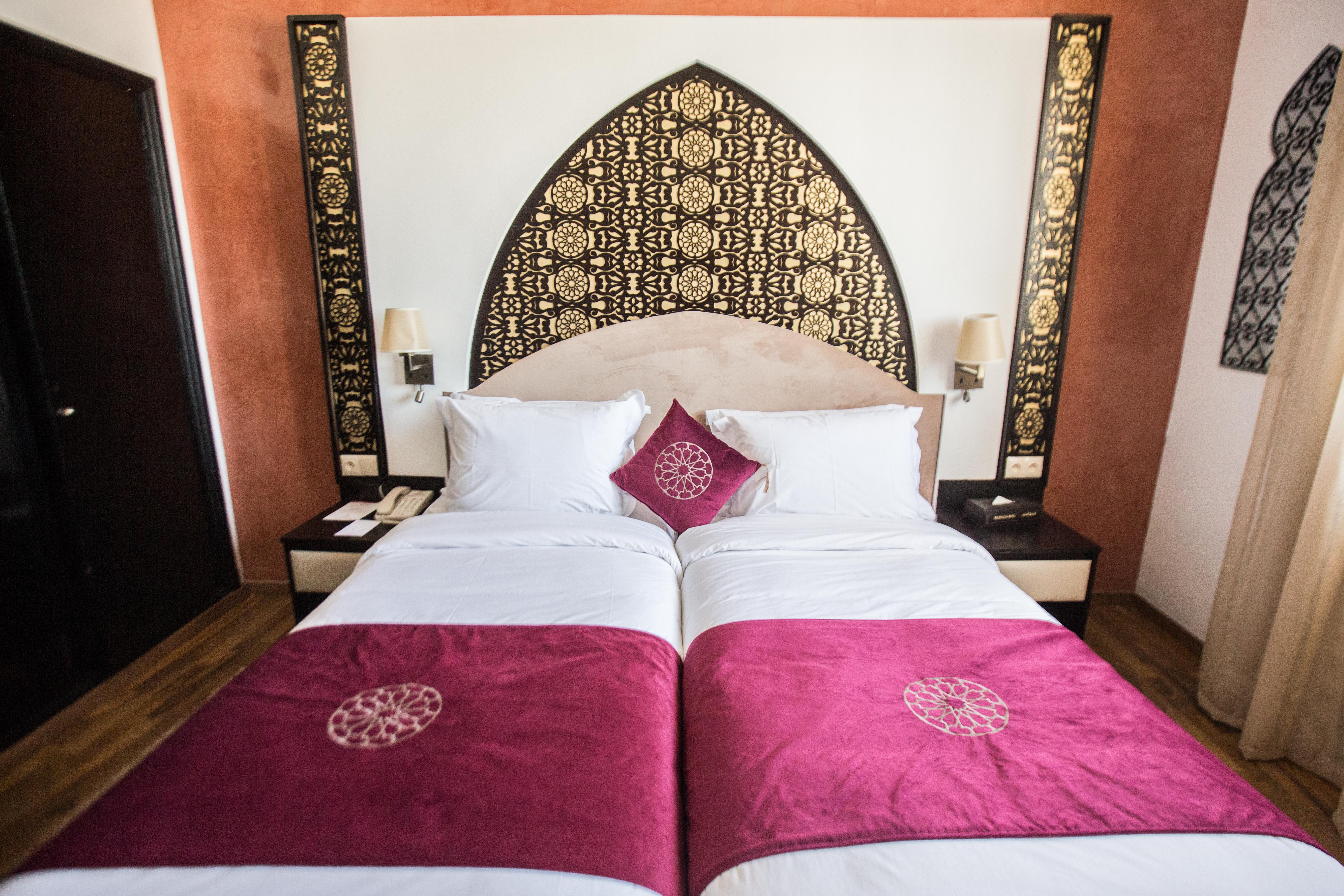 El Minzah Hotel Tanger Buitenkant foto A bedroom at the hotel